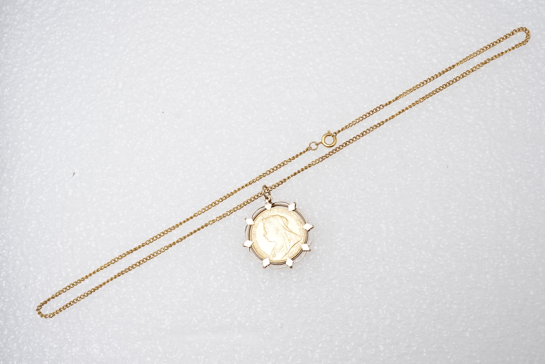 A Victorian sovereign coin pendant, circa 1898 and later